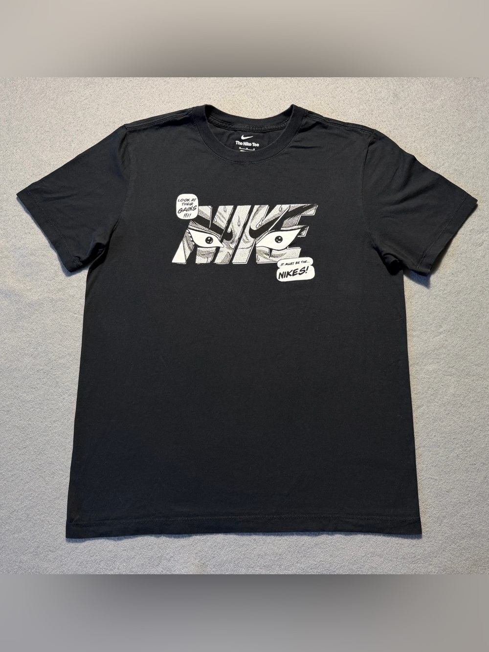 Nike Men’s Graphic T-Shirt Size M Black Comic Manga Eyes Crew Neck Tee